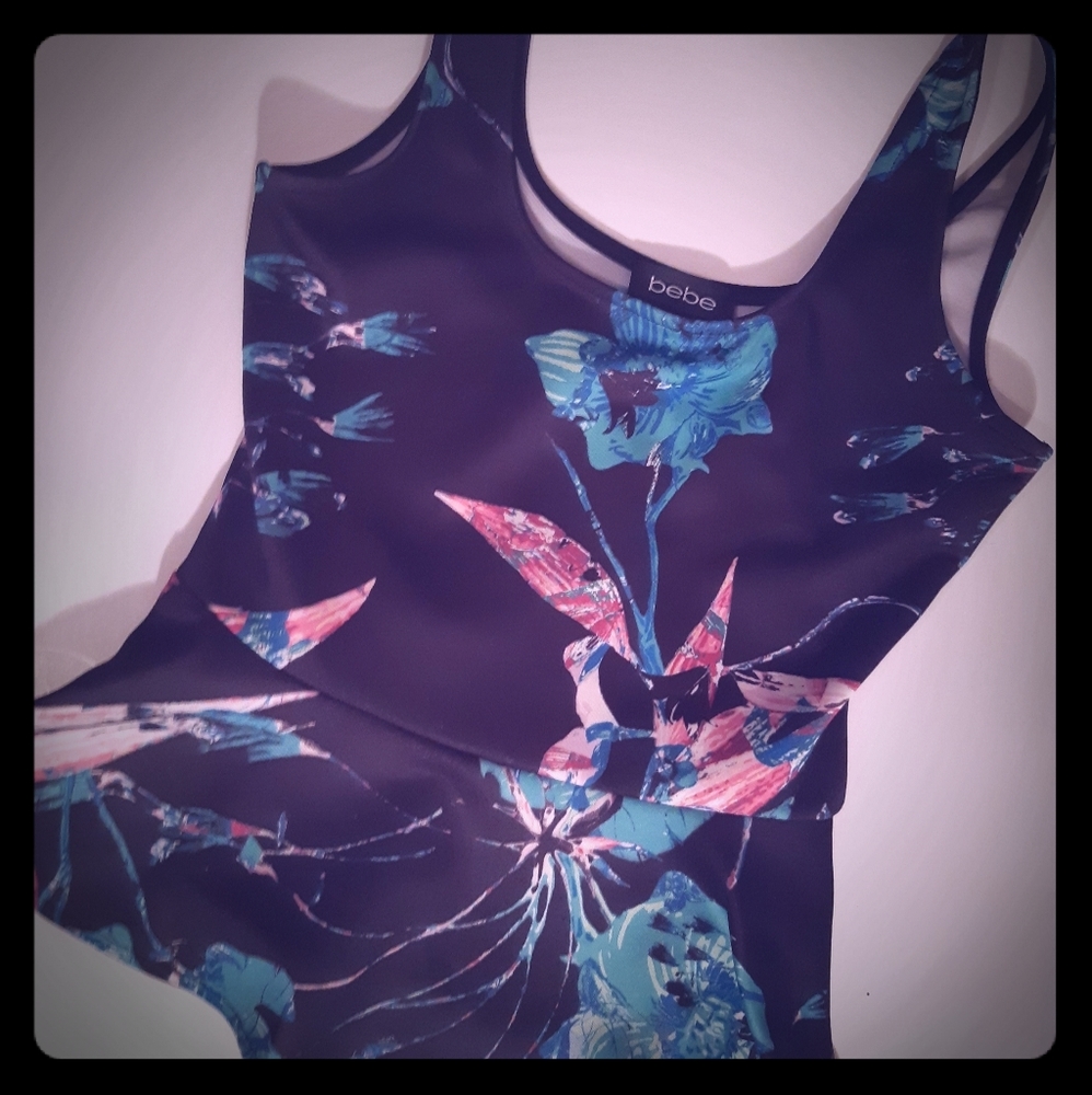 3/25$ Bebe lady swimwear size small